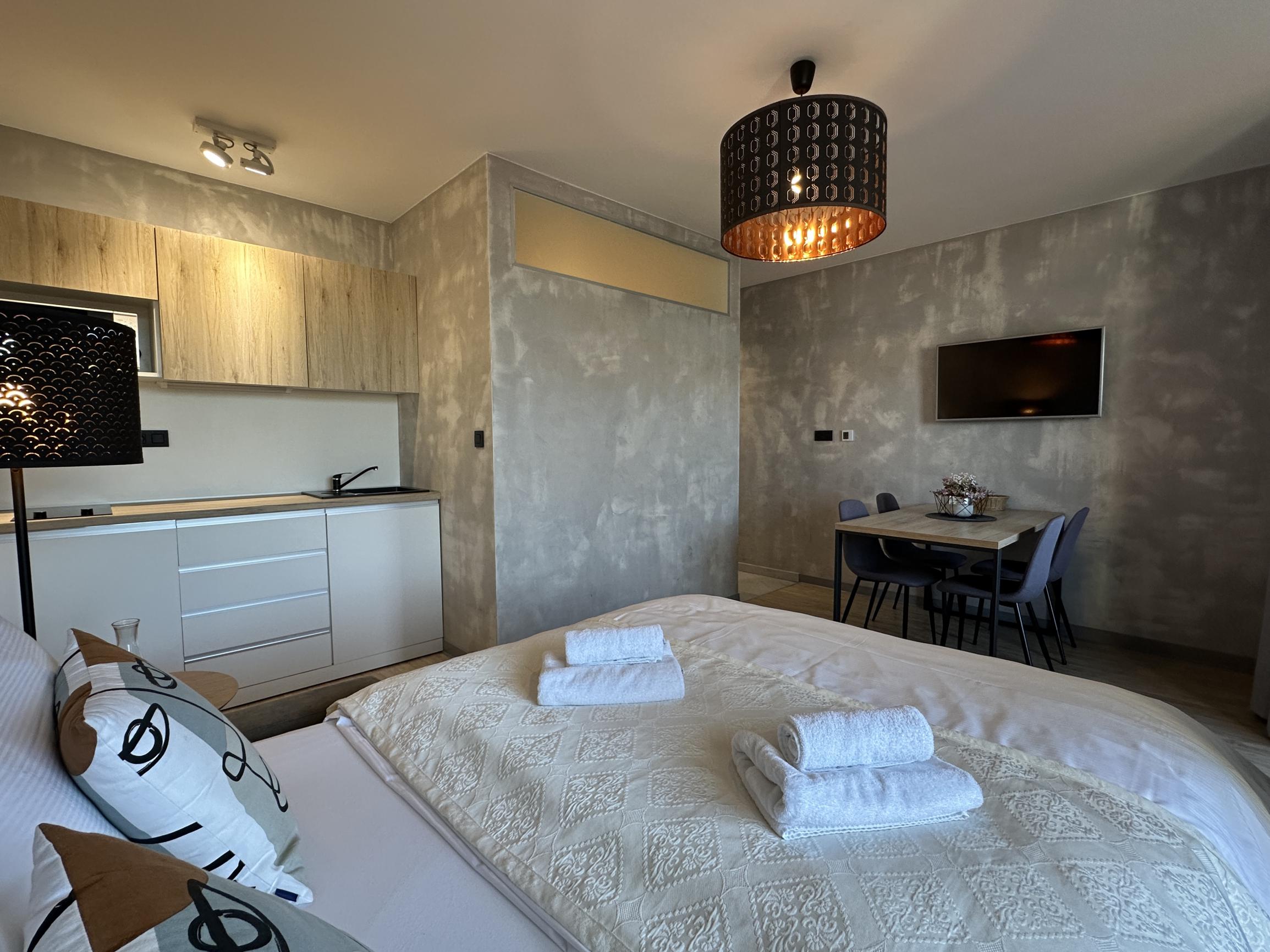 NEWDAY | NA PREDAJ 2-izbový apartmán + KK (39,3 m2) + lodžia 8,9 m2 | Jánsky rezort - Liptovský Ján